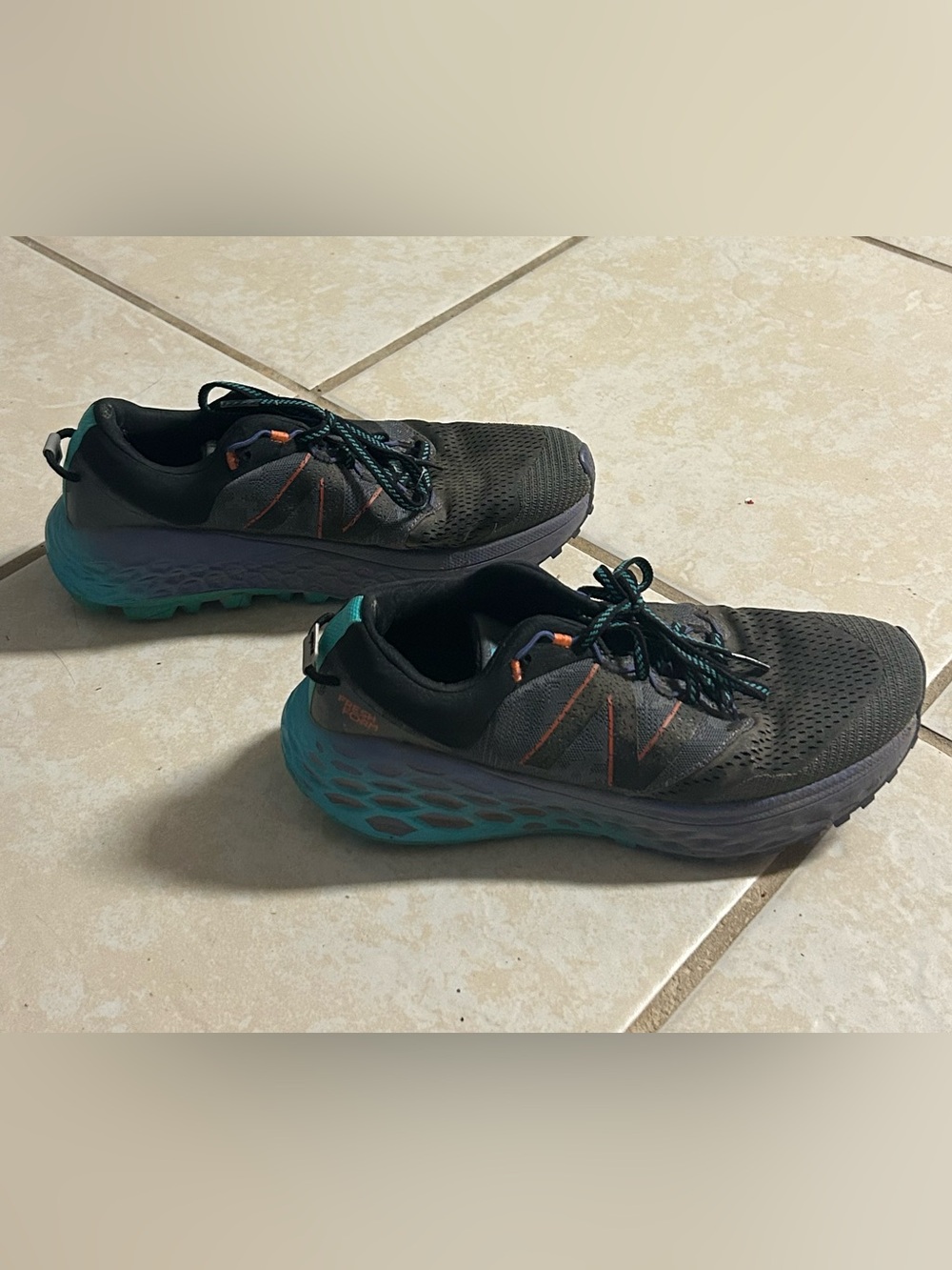 New Balance Trail Running Shoes in Black with Teal Soles